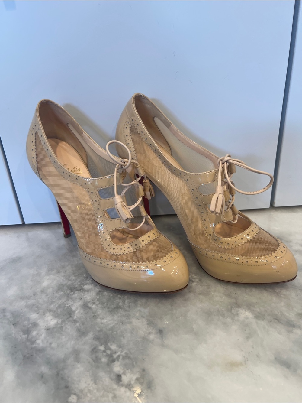 Christian Louboutin Nude Patent Lace-Up Heels with Red Soles